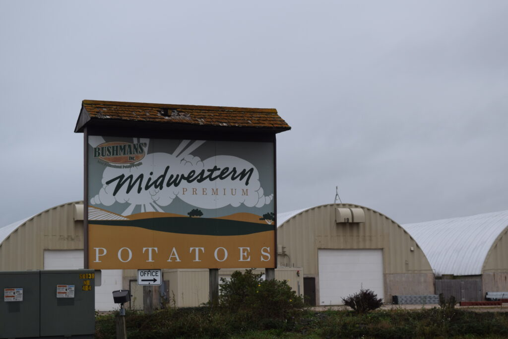 Bushmans' Inc Midwester Premium Potatoes sign