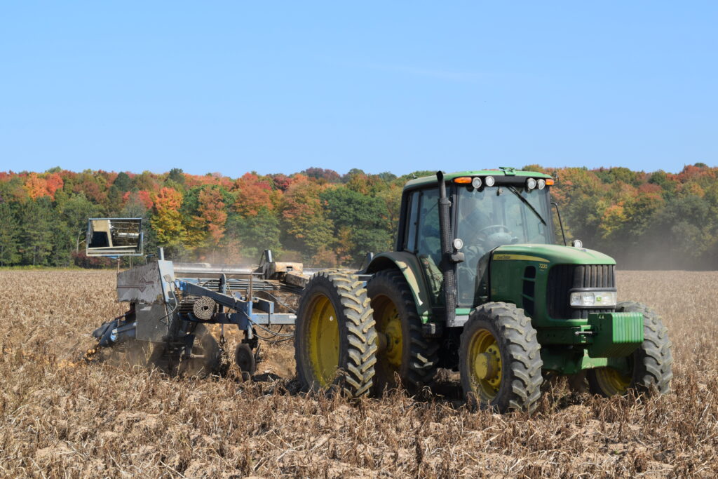 Tractor in potato field