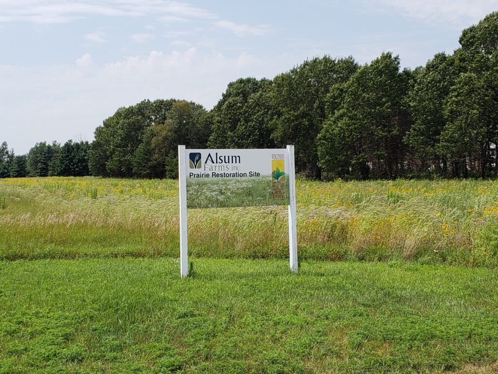 Sign for Alsum Farms Inc Prairie Restoration Site