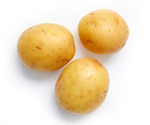 Raw yellow potatoes